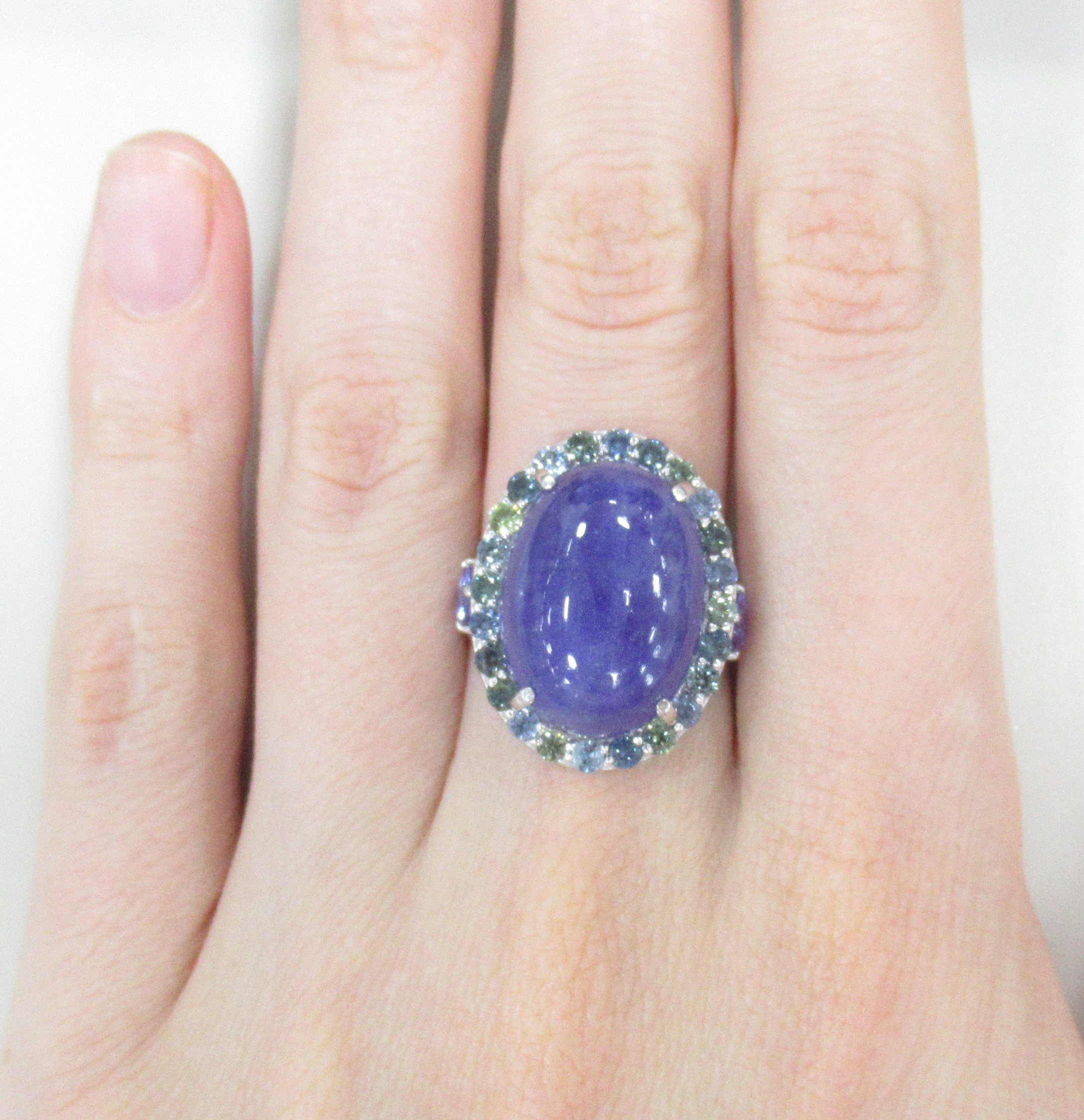 Серебряное кольцо 925 пробы; вставки 3 Танзанит; 24 Мультисапфир;